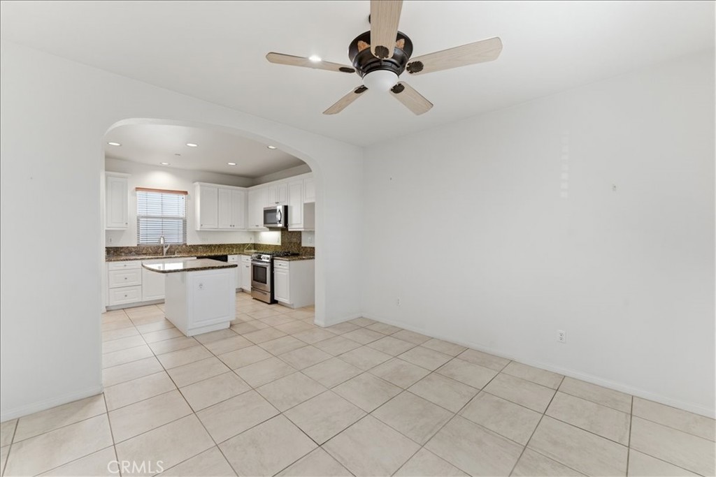 480 Santa Maria Street Anaheim, CA 92801 - Photo 5 of 17 a view of kitchen with microwave and stove