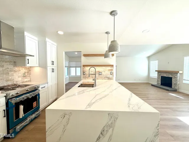 a bathroom with a sink a mirror and a