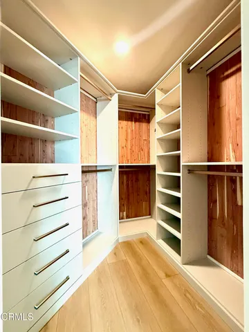 a bathroom with a double vanity sink mirror and