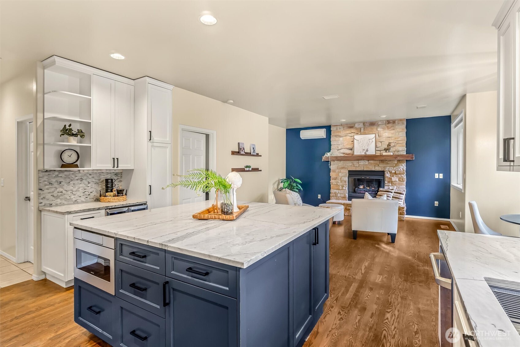 13718 58th Street Southeast Snohomish, WA 98290 - Photo 13 of 40 a open kitchen with sink a stove and chairs