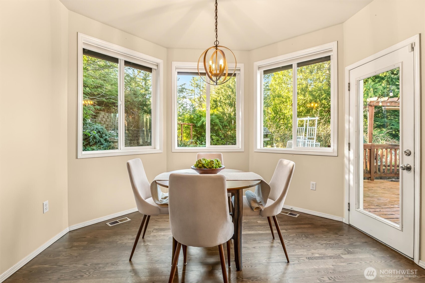 13718 58th Street Southeast Snohomish, WA 98290 - Photo 14 of 40 a dining room with furniture window wooden floor