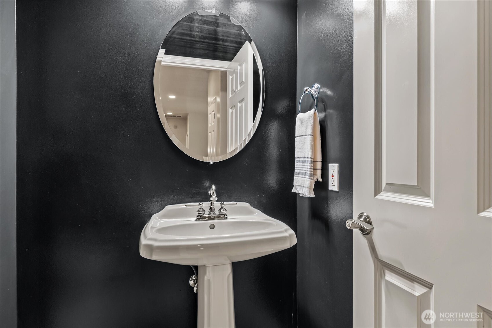 13718 58th Street Southeast Snohomish, WA 98290 - Photo 16 of 40 a bathroom with a sink and mirror