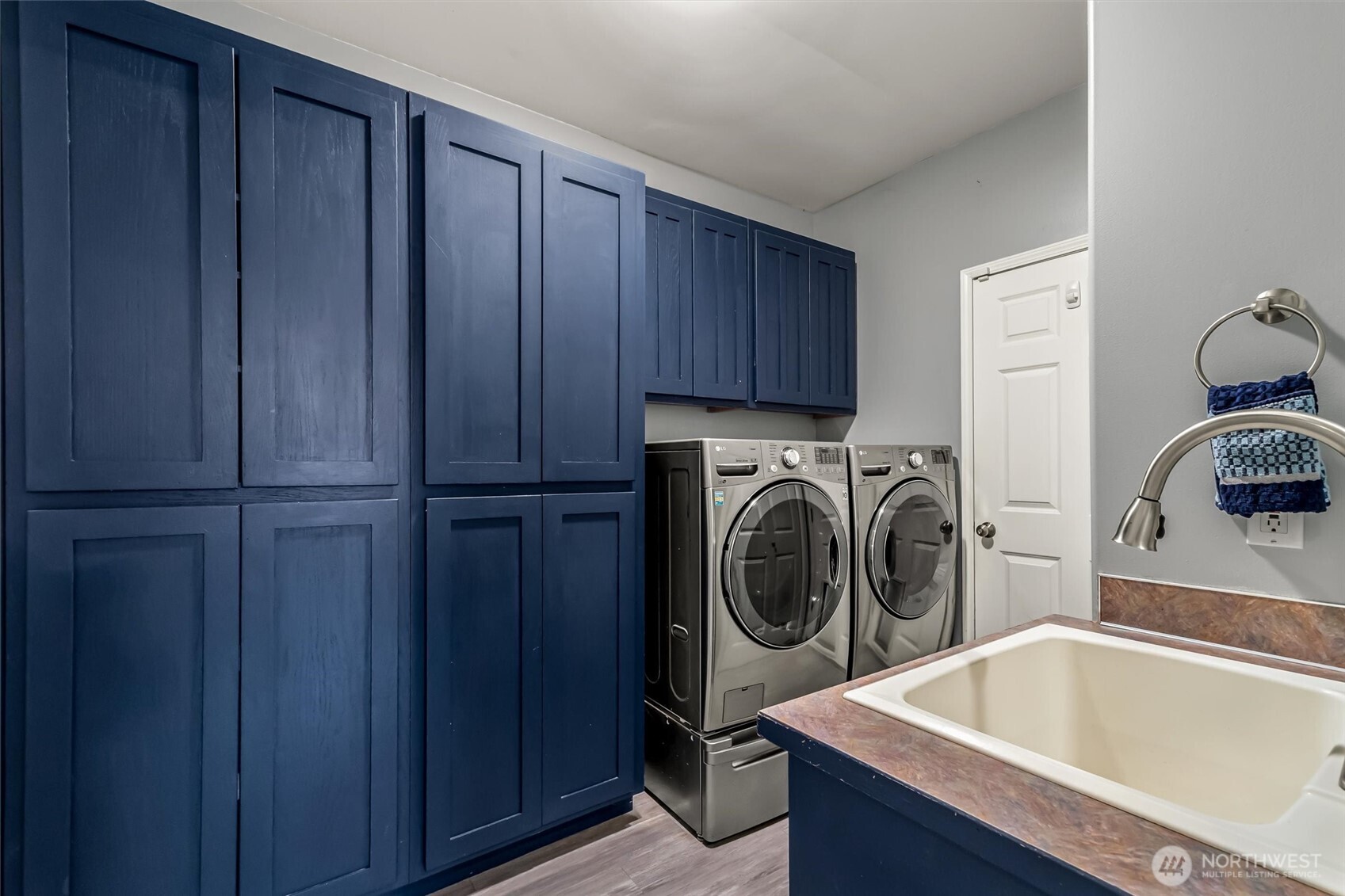 13718 58th Street Southeast Snohomish, WA 98290 - Photo 17 of 40 a utility room with sink dryer and washer