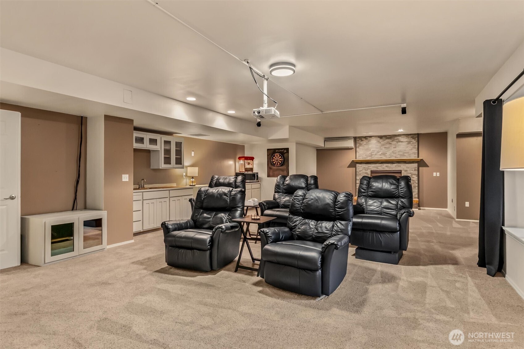 13718 58th Street Southeast Snohomish, WA 98290 - Photo 25 of 40 a living room with furniture and a fireplace