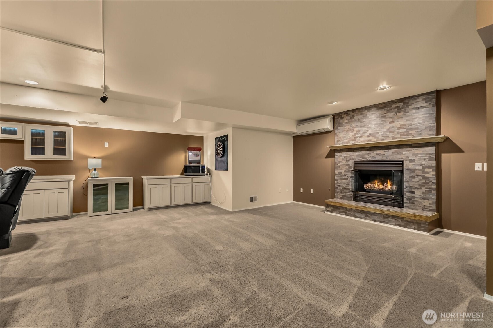 13718 58th Street Southeast Snohomish, WA 98290 - Photo 26 of 40 a view of a livingroom with an empty space and a fireplace