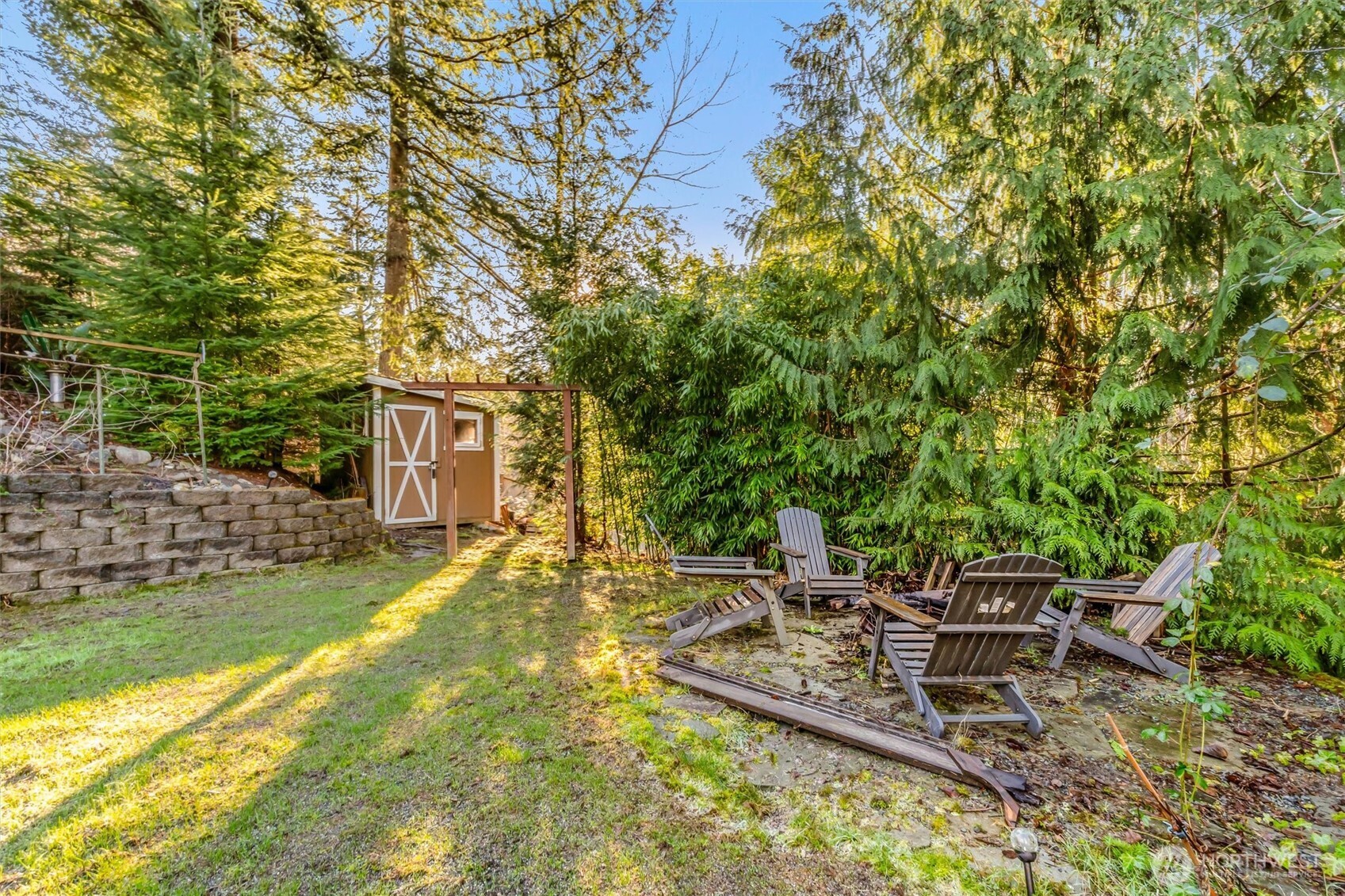 13718 58th Street Southeast Snohomish, WA 98290 - Photo 32 of 40 a view of yard with swimming pool and sitting area