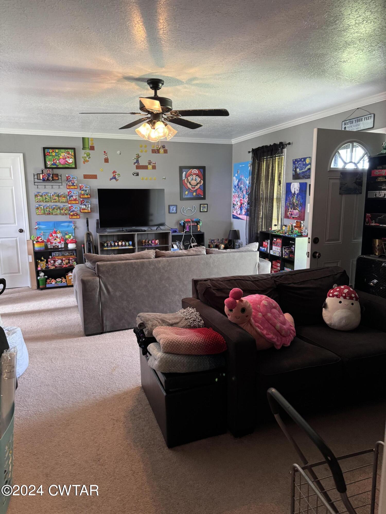19 Ora Goad Road Dyer, TN 38330 - Photo 3 of 12 a living room with furniture and a flat screen tv