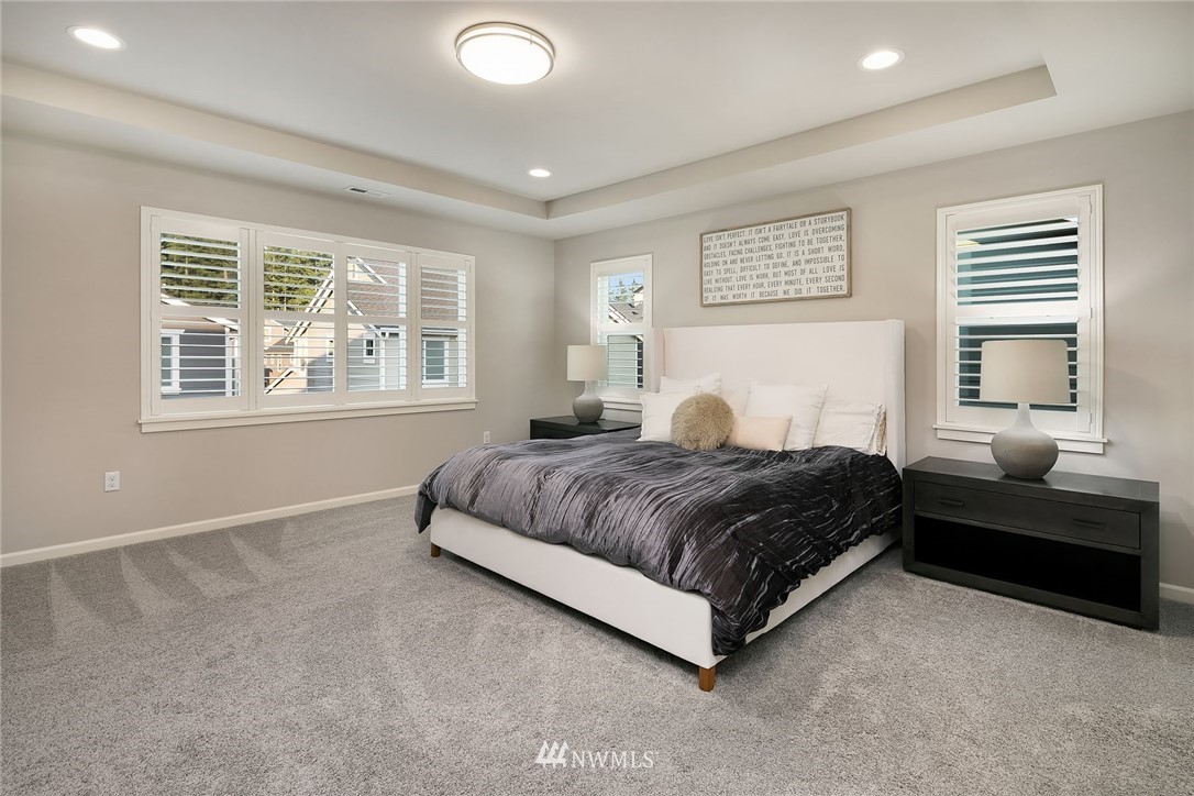 18607 45th Avenue Southeast Bothell, WA 98012 - Photo 13 of 23 a bedroom with a bed and window