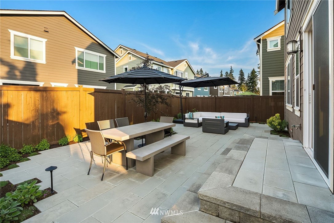 18607 45th Avenue Southeast Bothell, WA 98012 - Photo 19 of 23 a backyard of a house with outdoor seating