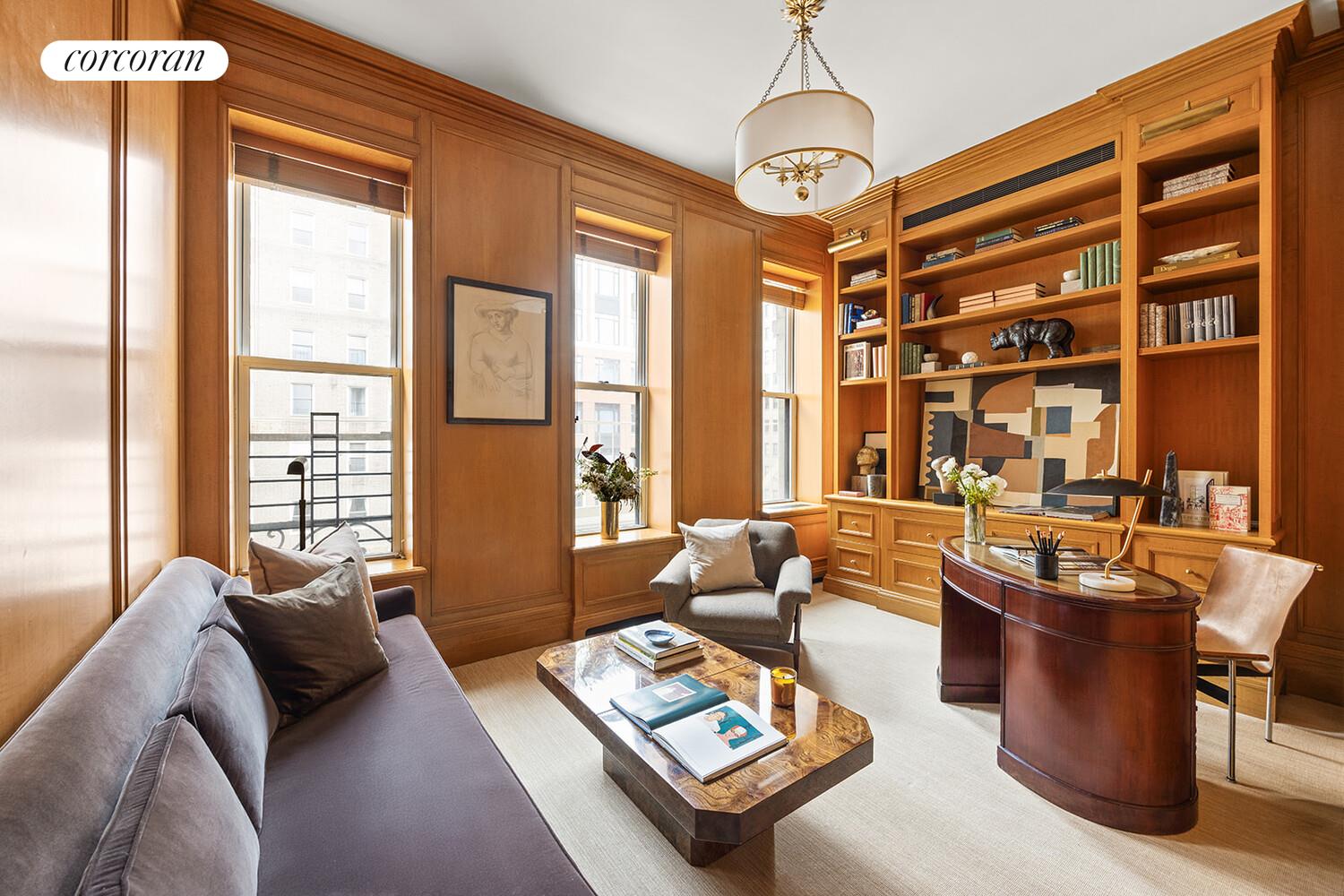 16 East 96th Street, Unit 7B Manhattan, NY 10128 - Photo 13 of 55 a living room with furniture and a window