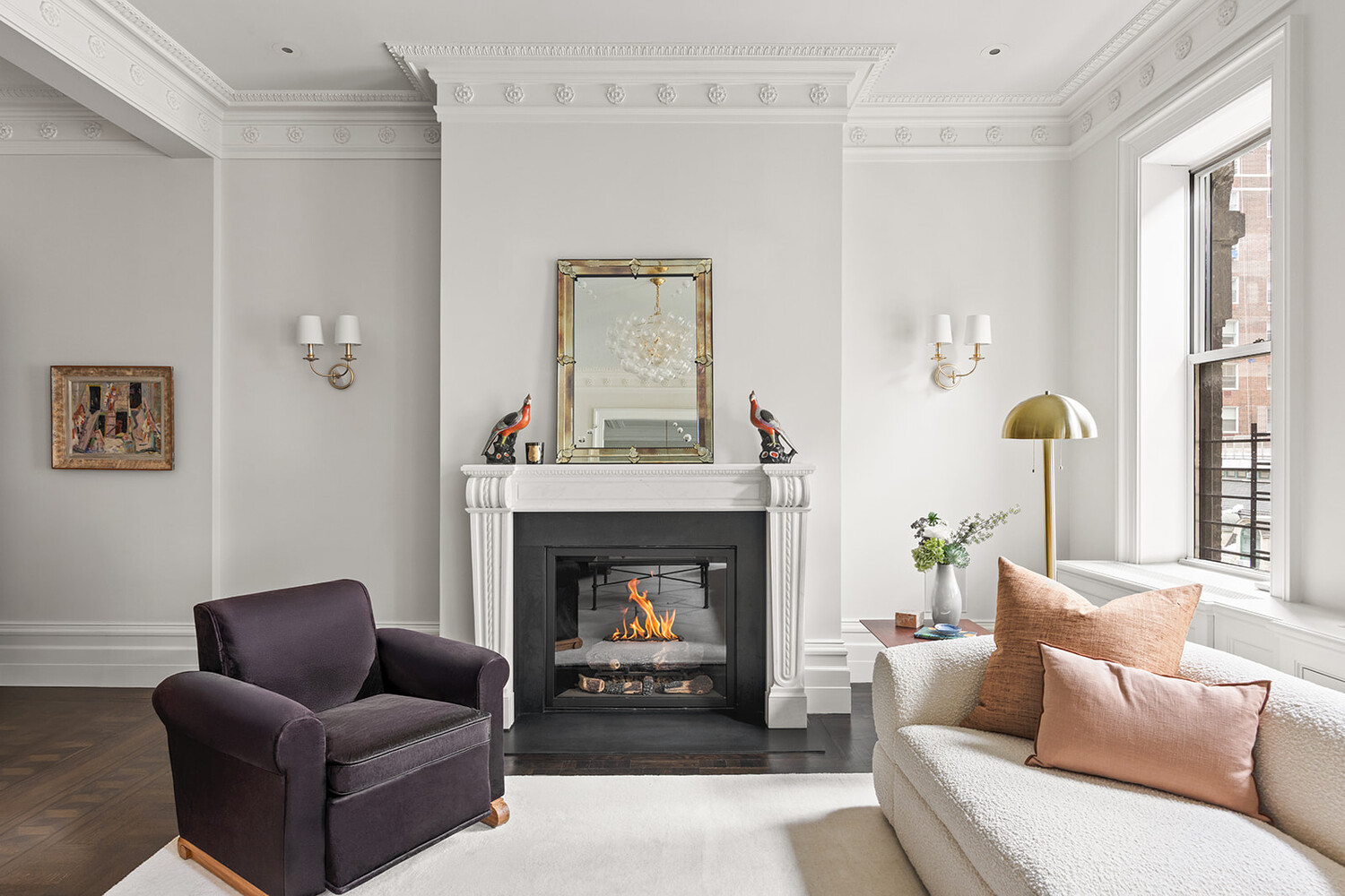 16 East 96th Street, Unit 7B Manhattan, NY 10128 - Photo 18 of 55 a living room with furniture and a fireplace