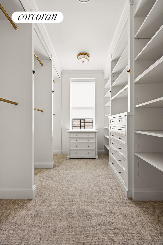 16 East 96th Street, Unit 7B Manhattan, NY 10128 - Photo 19 of 55 a view of bedroom with furniture and window