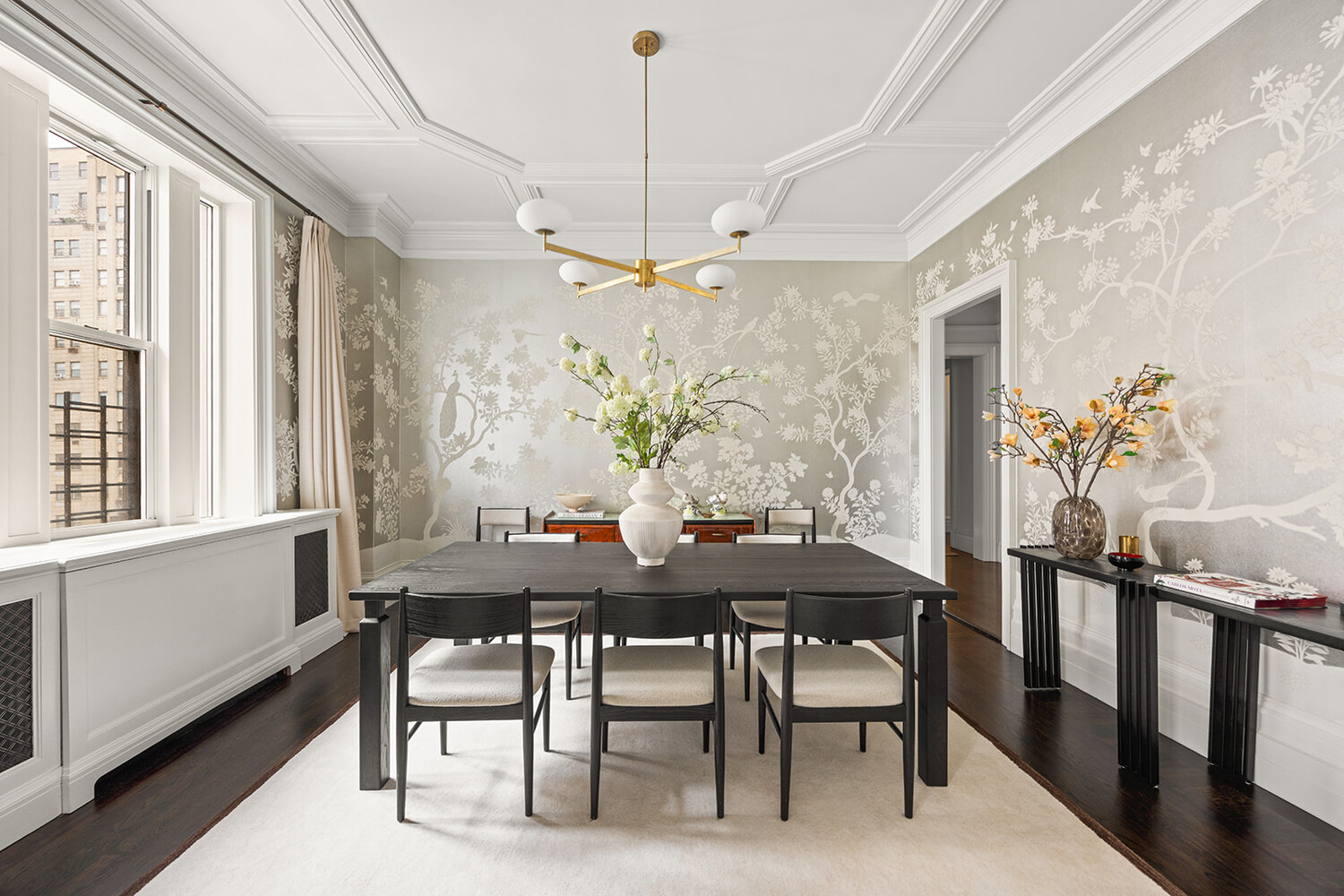 16 East 96th Street, Unit 7B Manhattan, NY 10128 - Photo 30 of 55 a view of a dining room with furniture window and wooden floor