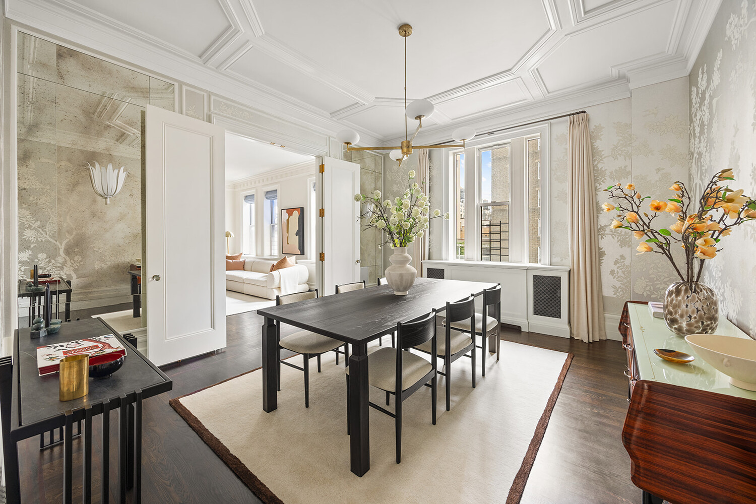 16 East 96th Street, Unit 7B Manhattan, NY 10128 - Photo 33 of 55 a view of a dining room with furniture window and wooden floor