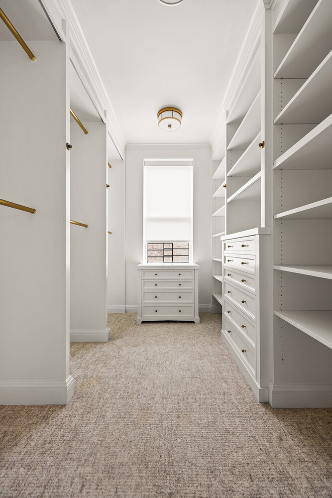 16 East 96th Street, Unit 7B Manhattan, NY 10128 - Photo 43 of 55 a view of an empty room with a window