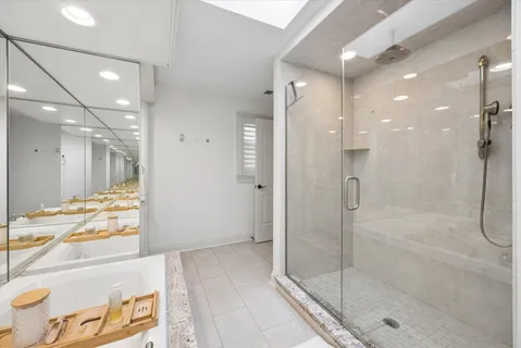 a bedroom with a bed closet and a window