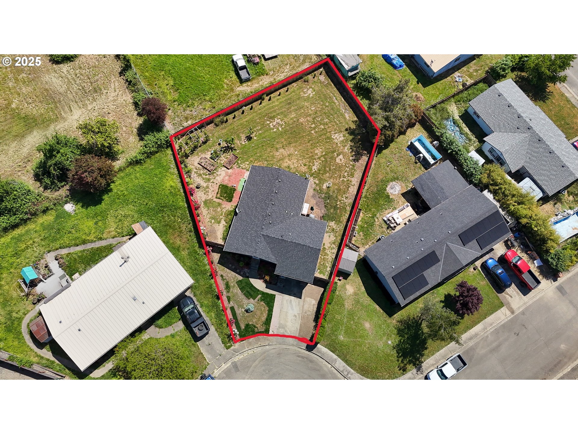 715 Penny Lane Riddle, OR 97469 - Photo 14 of 32 an aerial view of a house with a yard