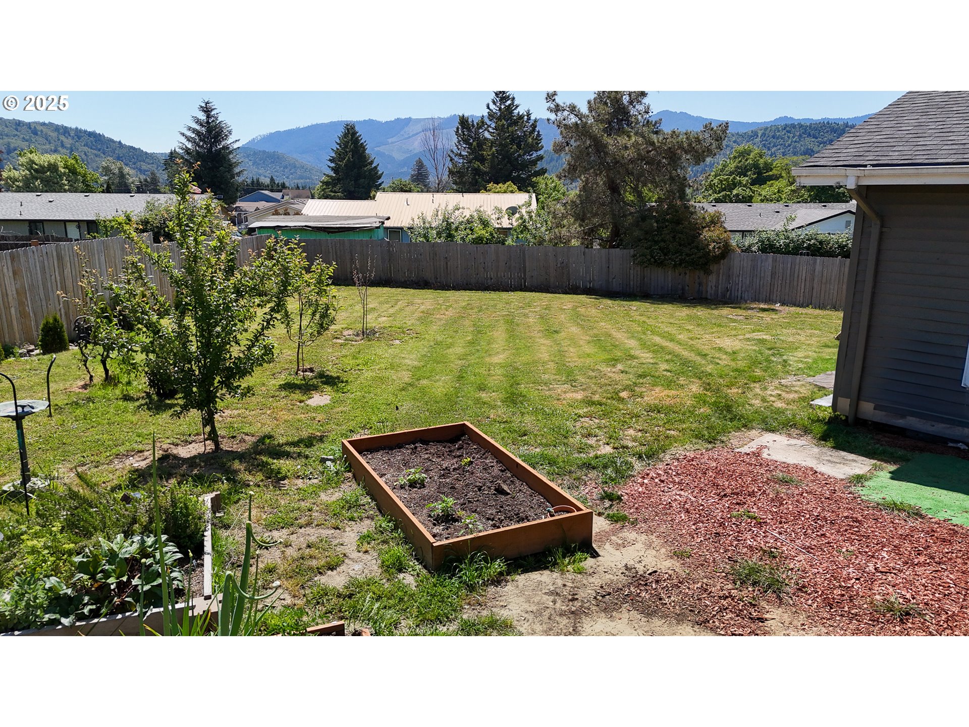 715 Penny Lane Riddle, OR 97469 - Photo 18 of 32 a view of a back yard