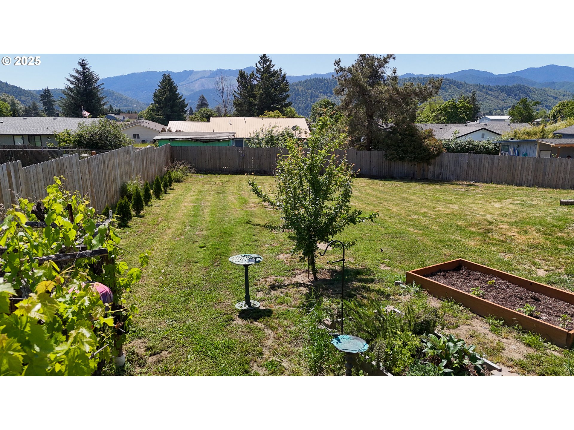 715 Penny Lane Riddle, OR 97469 - Photo 20 of 32 a picture of city view with lake view