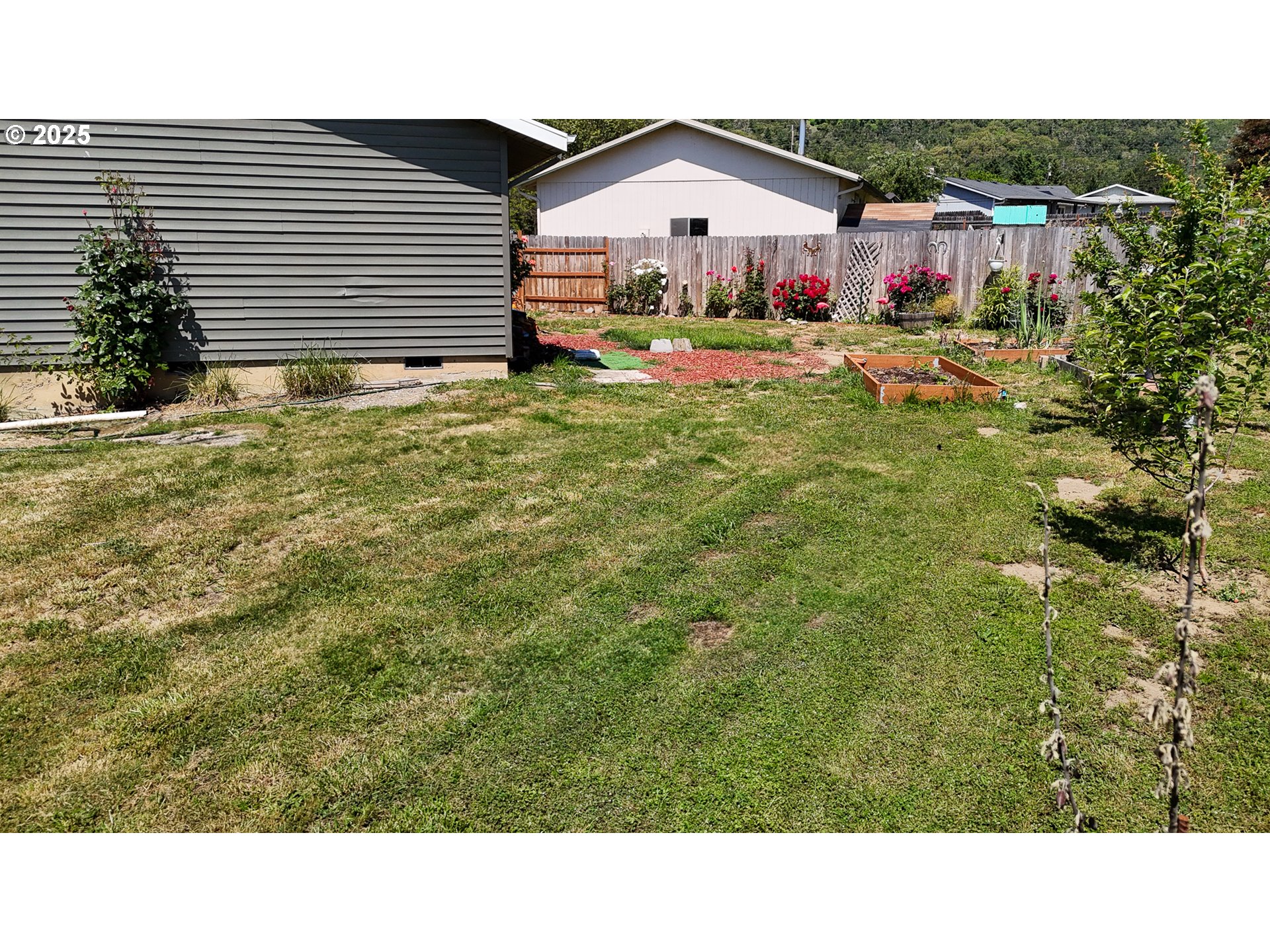 715 Penny Lane Riddle, OR 97469 - Photo 21 of 32 a bathroom with a sink and a vanity