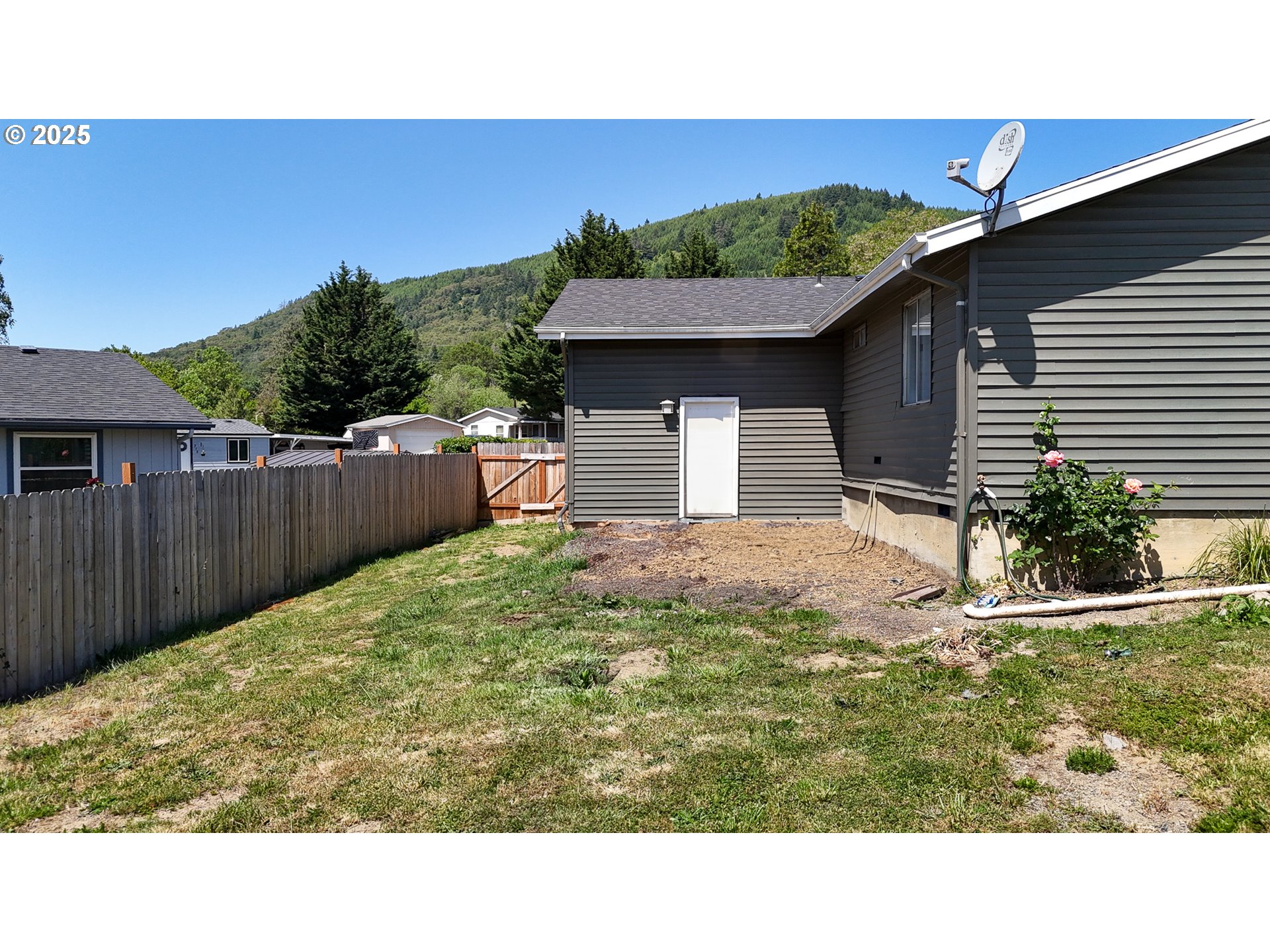 715 Penny Lane Riddle, OR 97469 - Photo 24 of 32 a black and white photo of a house