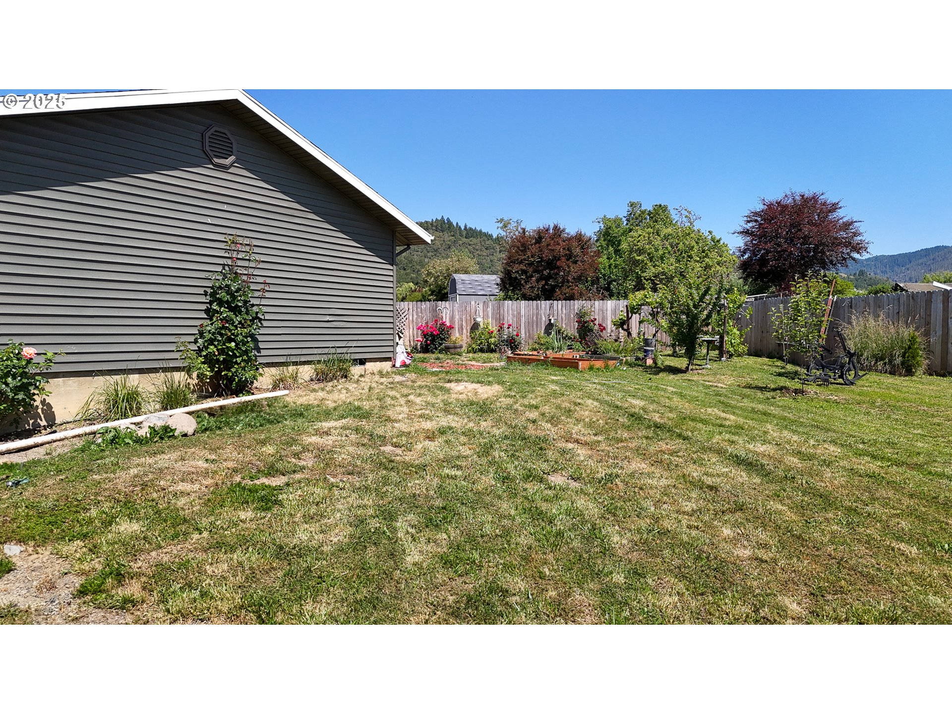 715 Penny Lane Riddle, OR 97469 - Photo 25 of 32 a black and white photo of a house