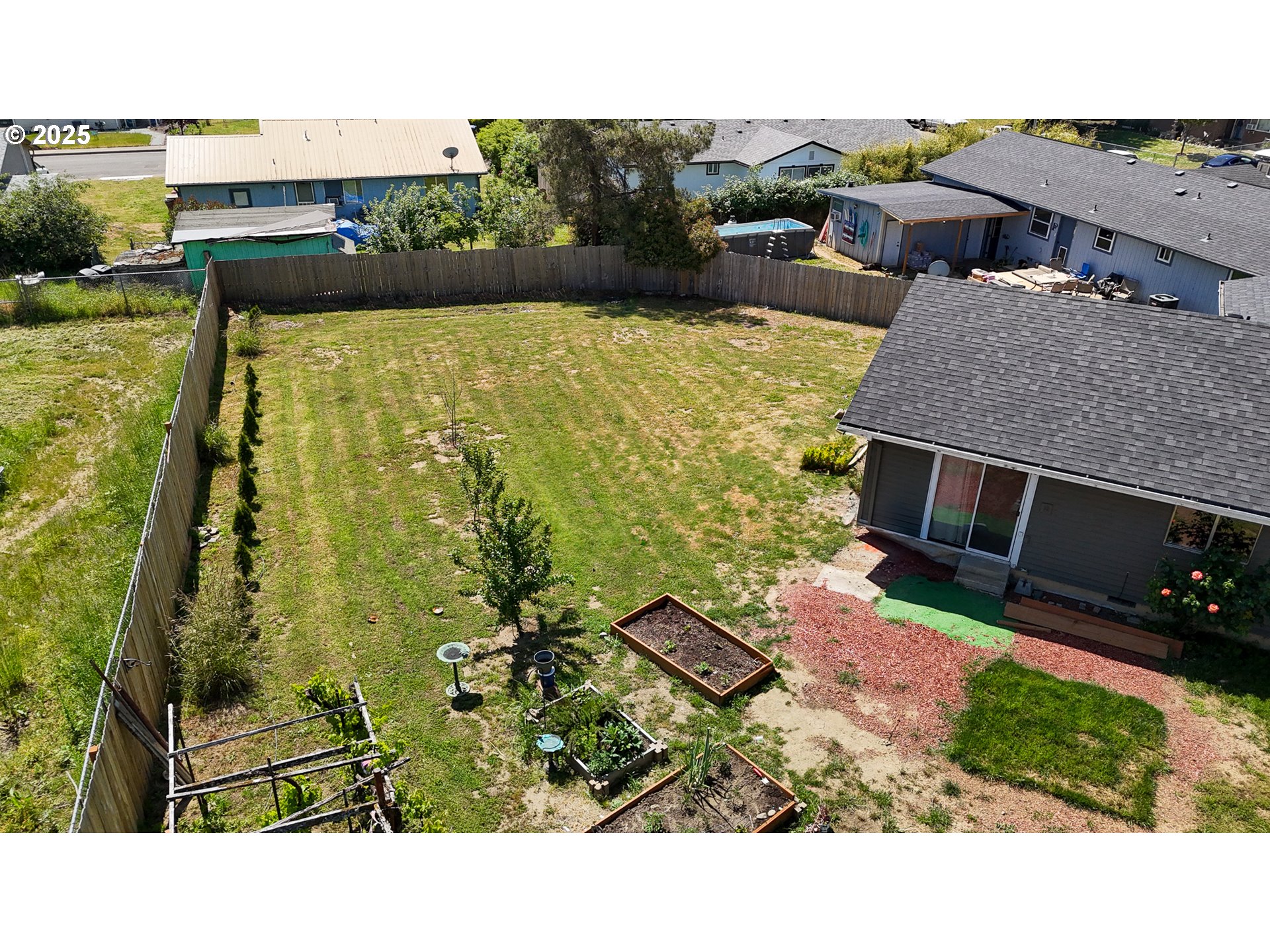 715 Penny Lane Riddle, OR 97469 - Photo 31 of 32 a aerial view of a house with a yard