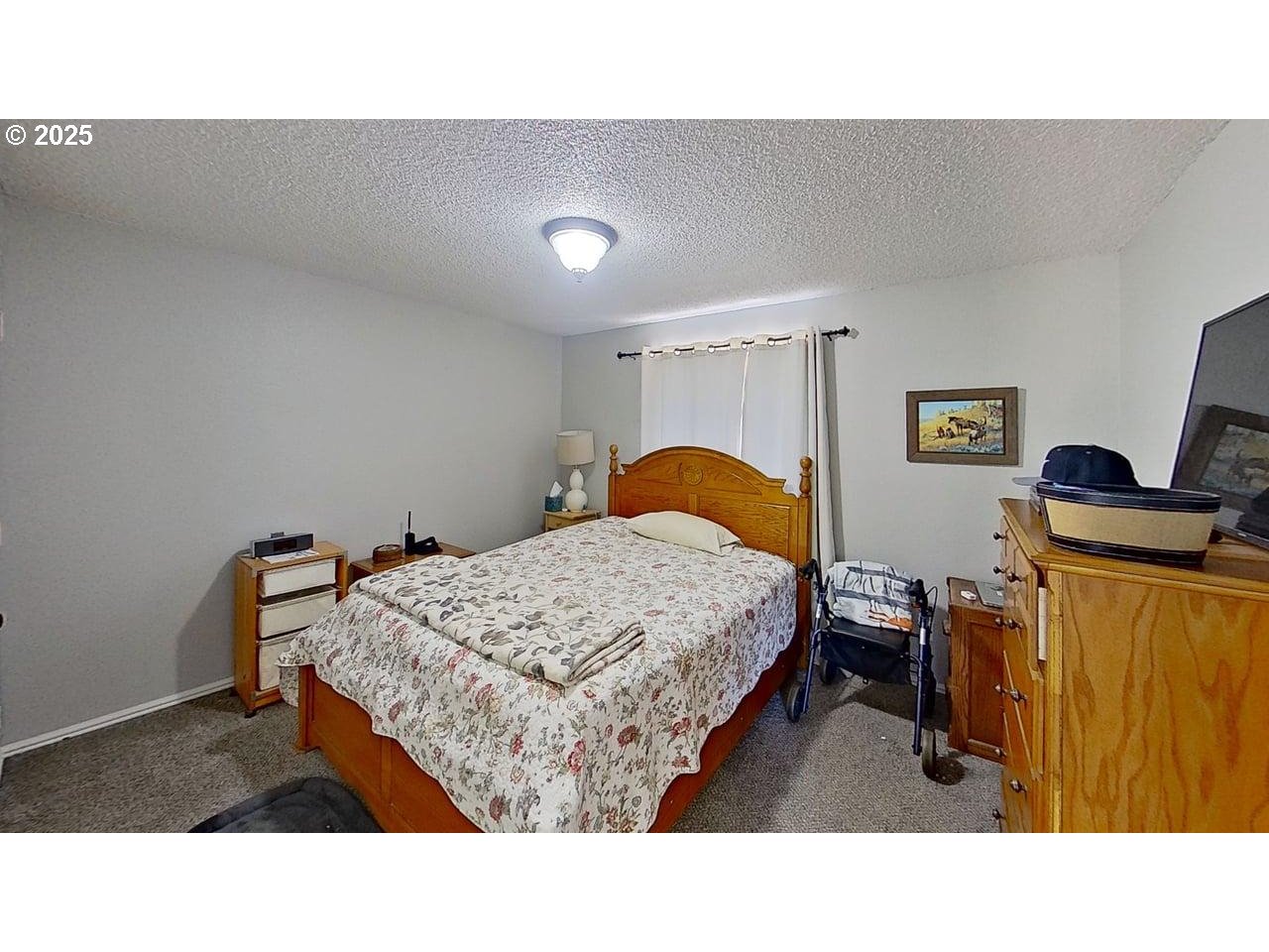 715 Penny Lane Riddle, OR 97469 - Photo 10 of 32 a living room with furniture and a dresser