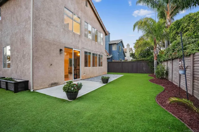 a view of a back yard of the house