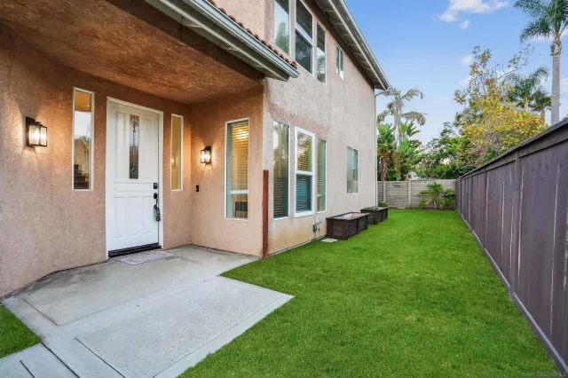 a view of a porch with a backyard