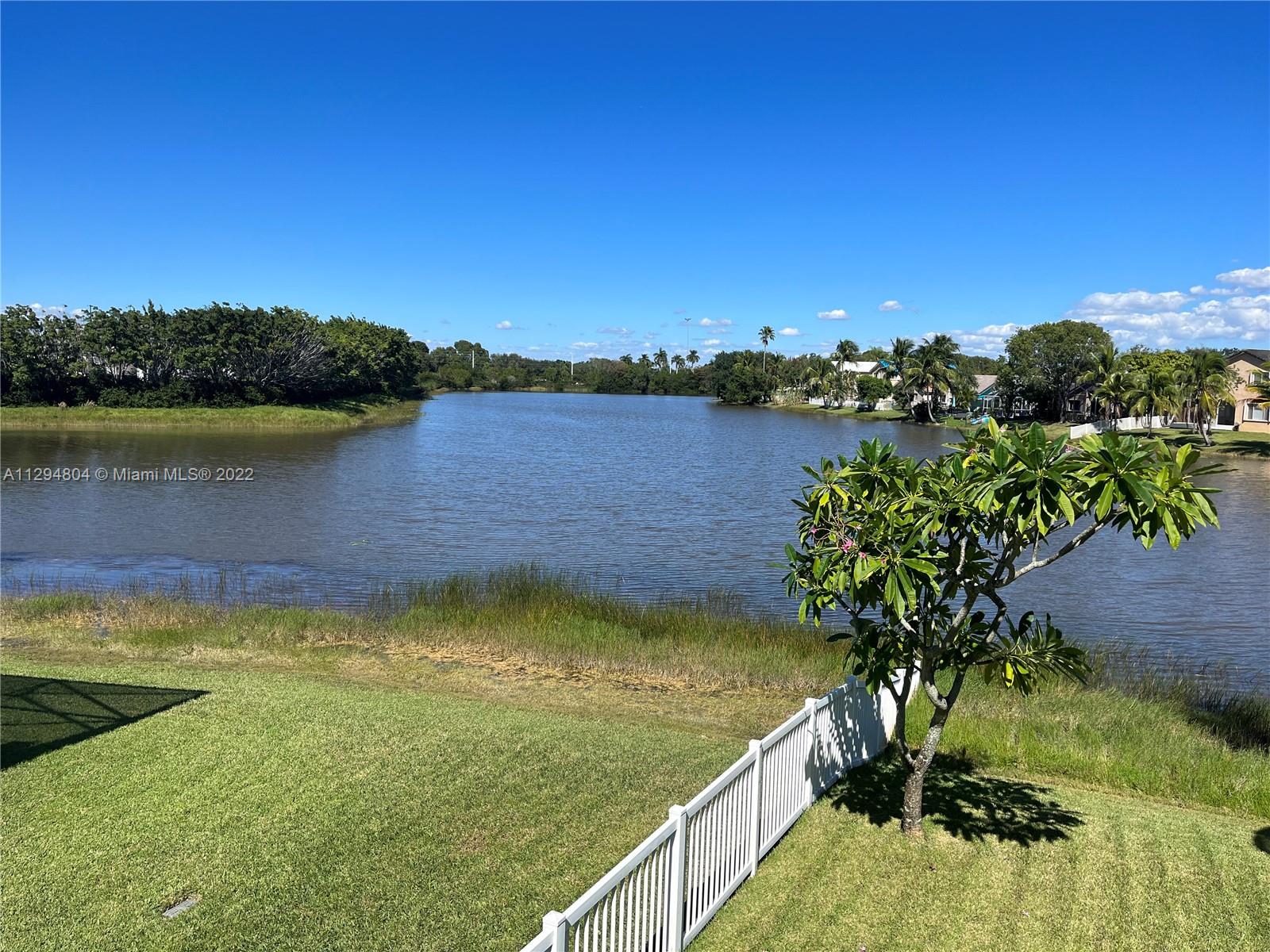 18249 Southwest 3rd Street Pembroke Pines, FL 33029 - Photo 17 of 40 a view of a lake with a city