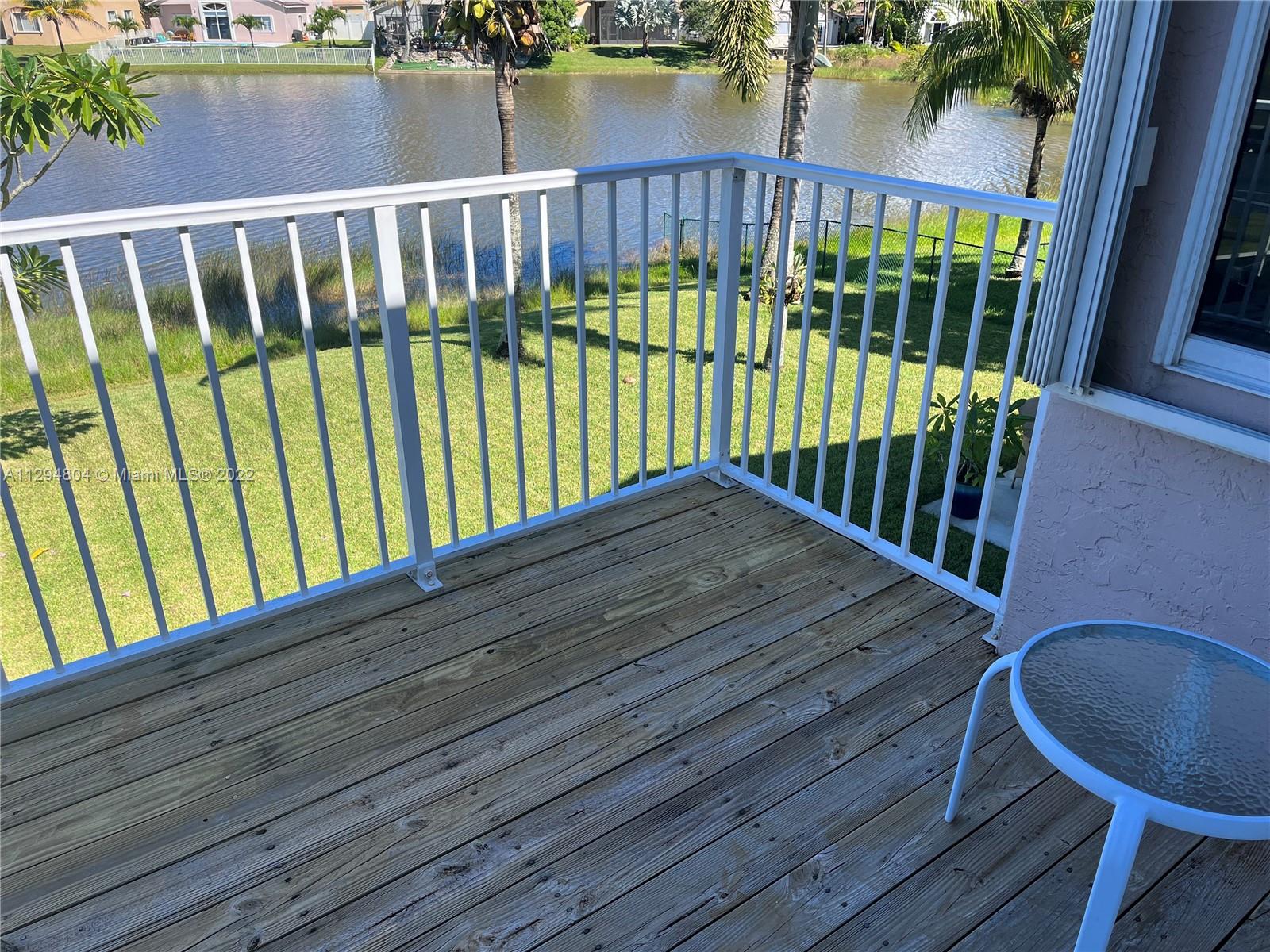 18249 Southwest 3rd Street Pembroke Pines, FL 33029 - Photo 19 of 40 a view of balcony with wooden floor