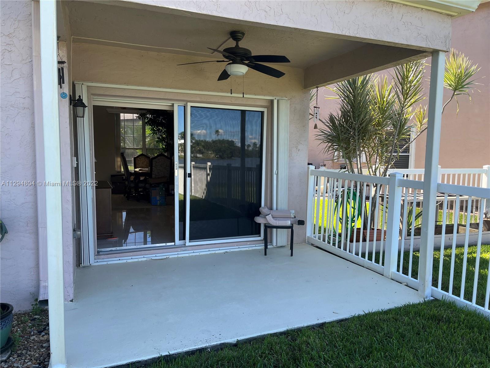 18249 Southwest 3rd Street Pembroke Pines, FL 33029 - Photo 25 of 40 a view of a porch with a floor to ceiling window