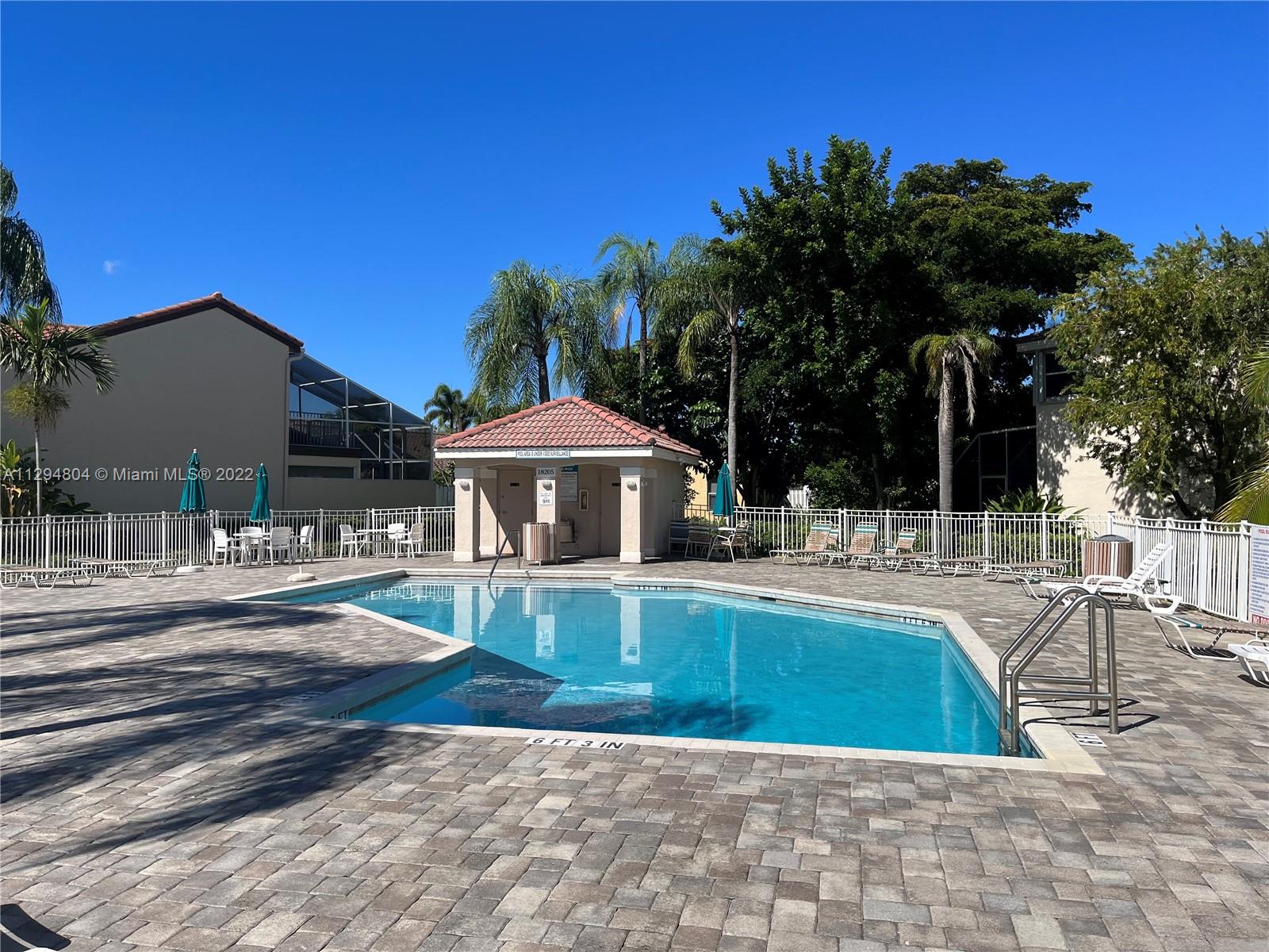 18249 Southwest 3rd Street Pembroke Pines, FL 33029 - Photo 26 of 40 a view of a house with swimming pool