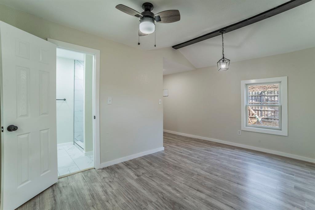 5914 Victor Street Dallas, TX 75214 - Photo 18 of 32 a view of an empty room with a window
