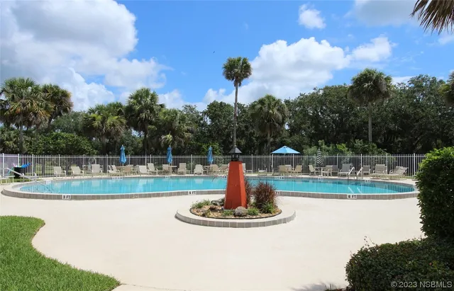 a view of a terrace with sitting area