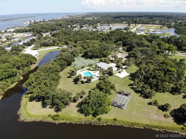 a view of a street with an ocean view