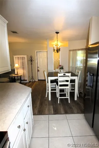 a kitchen with stainless steel appliances a stove top oven and cabinets
