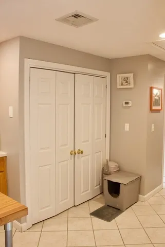 a bathroom with a glass shower door