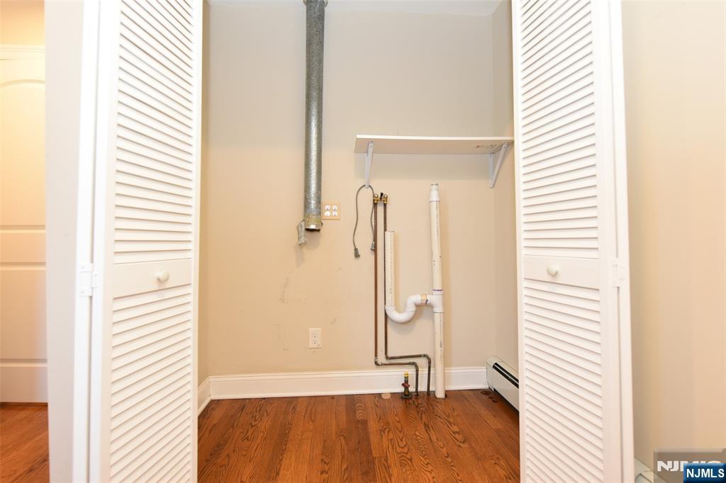 105 Parkway Rochelle Park, NJ 07662 - Photo 11 of 22 a bathroom with a tub and shower