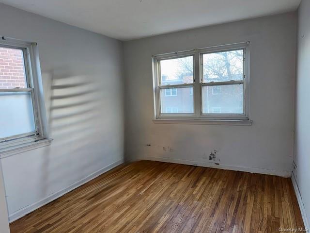 2832 Harding Avenue Bronx, NY 10465 - Photo 11 of 23 an empty room with a window