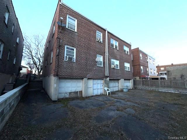 2832 Harding Avenue Bronx, NY 10465 - Photo 14 of 23 a front view of a house with a yard