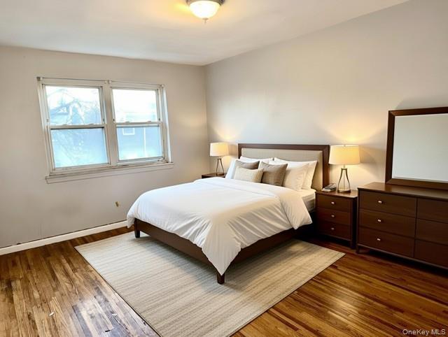 2832 Harding Avenue Bronx, NY 10465 - Photo 8 of 23 a bedroom with a bed and a window