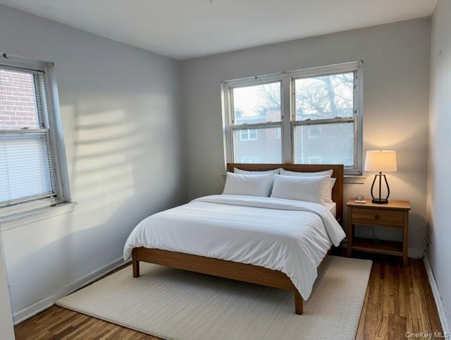 2832 Harding Avenue Bronx, NY 10465 - Photo 10 of 23 a bedroom with a bed and window
