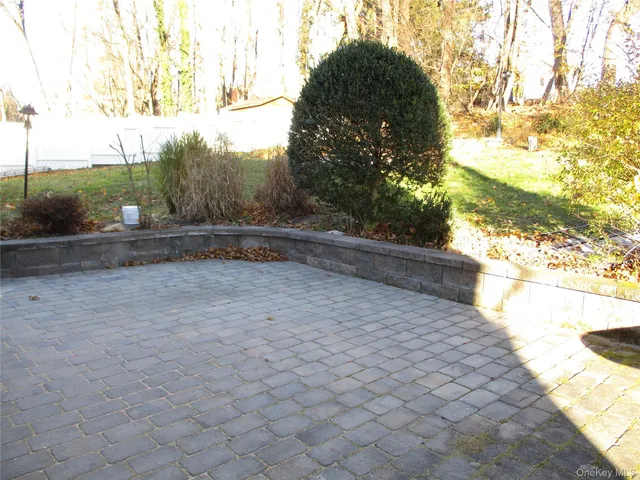 a view of backyard with green space