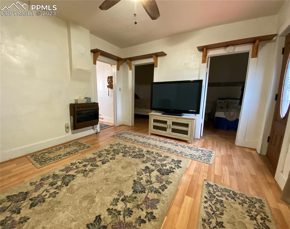 29088 County Road South Karval, CO 80823 - Photo 11 of 37 a living room with a flat screen tv and a rug