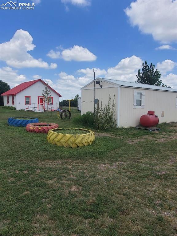 29088 County Road South Karval, CO 80823 - Photo 20 of 37 a view of a house with a yard