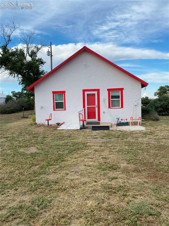 29088 County Road South Karval, CO 80823 - Photo 6 of 37 a backyard of a house with lots of green space