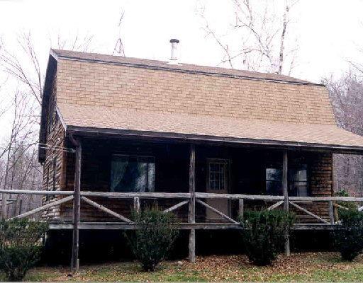 167 Town Hill Road Warren, CT 06754 - Photo 1 of 1 a front view of a house with garage