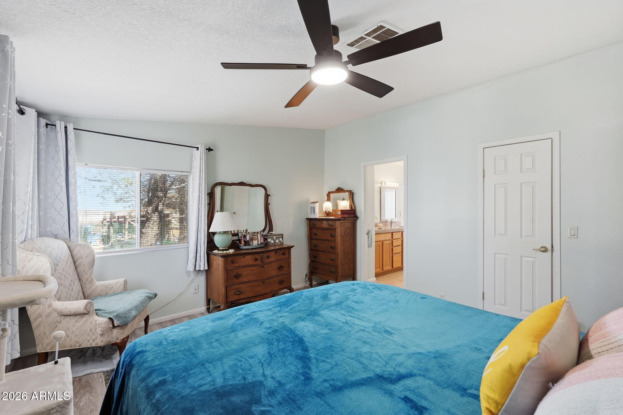 816 North Ridgeview Place Huachuca City, AZ 85616 - Photo 24 of 46 a bed room with a bed and furniture